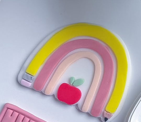 Arc en ciel école et règle