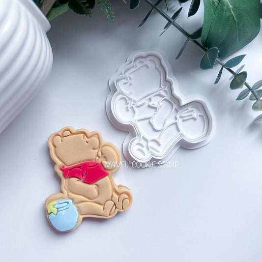Winnie l'ourson et son pot de miel
